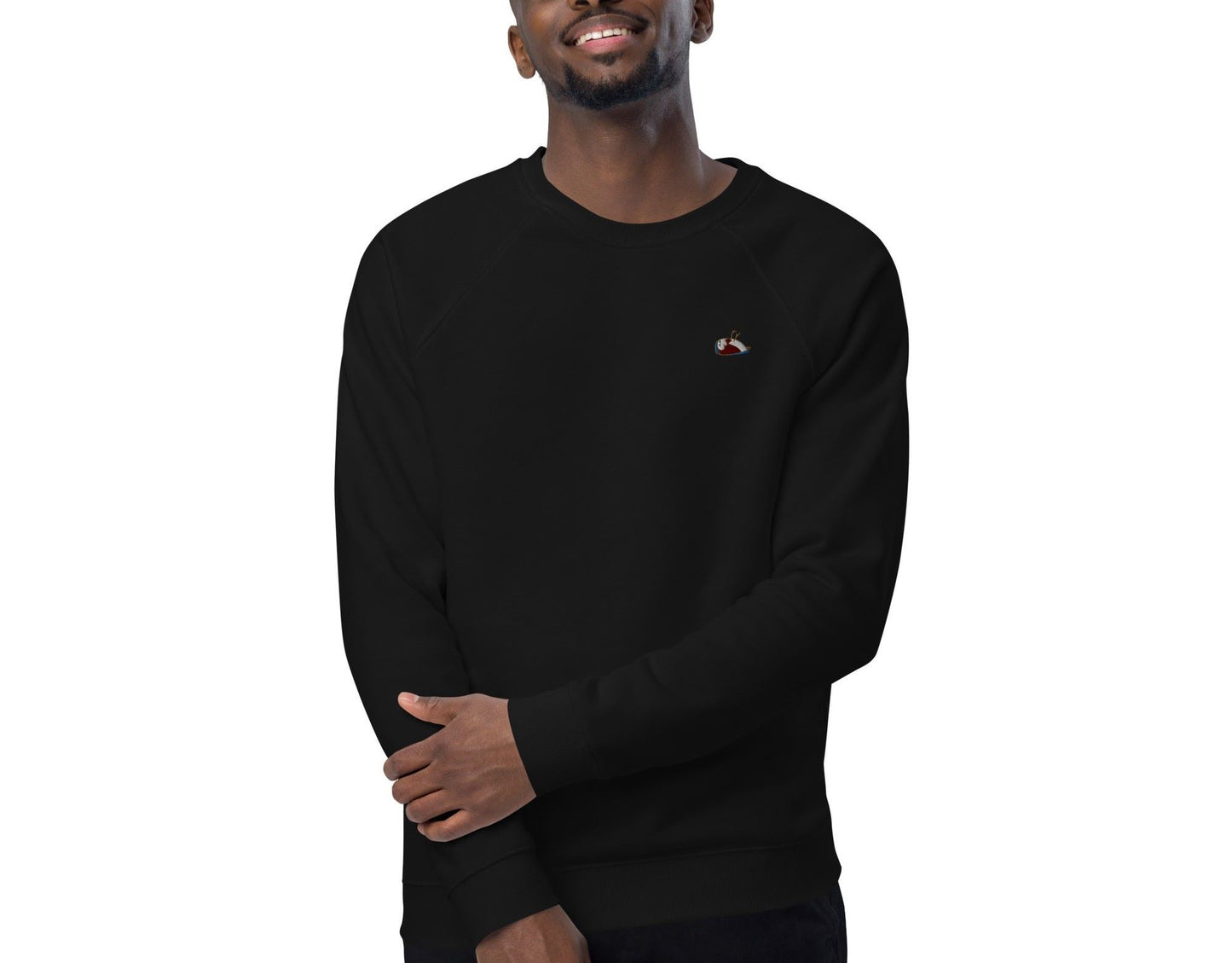 Close-up of a man wearing the Lovable organic sweatshirt in black. The sweatshirt has a multi-coloured sparrow embroidered on the left side.