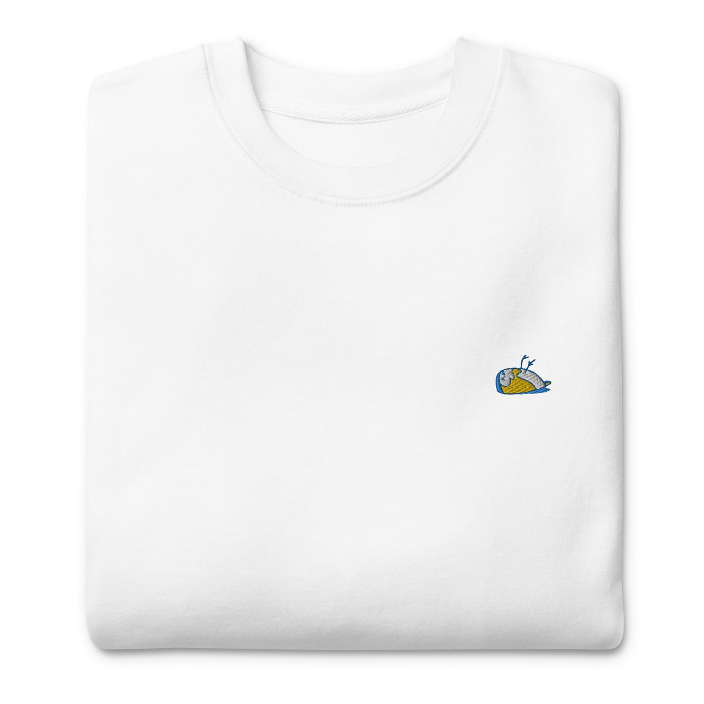 Image shows a folded sweater, Thoughtful. White with a multicoloured sparrow embroidered on the left side of the t-shirt.