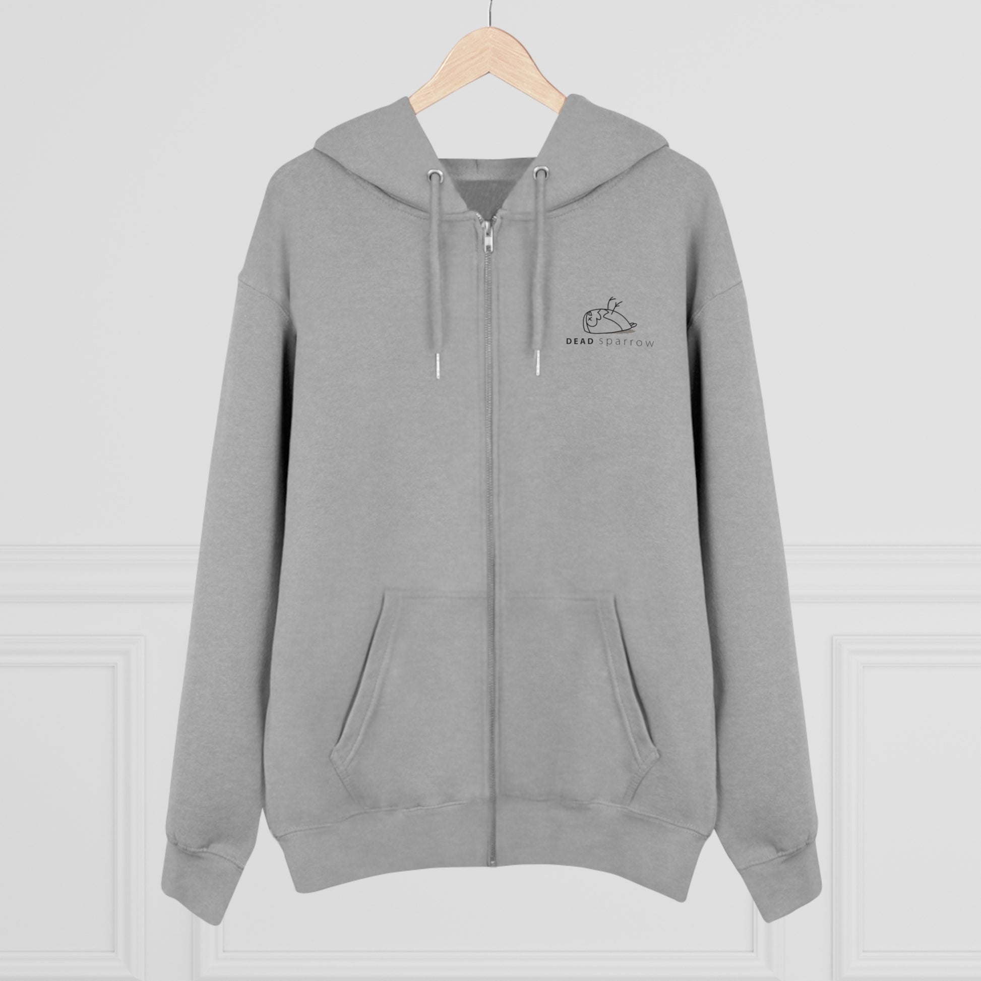 Close-up of a light grey zip-up hoodie, product nam Impeccable. The hoodie has a print on the left side, 'DEAD sparrow' (logo).