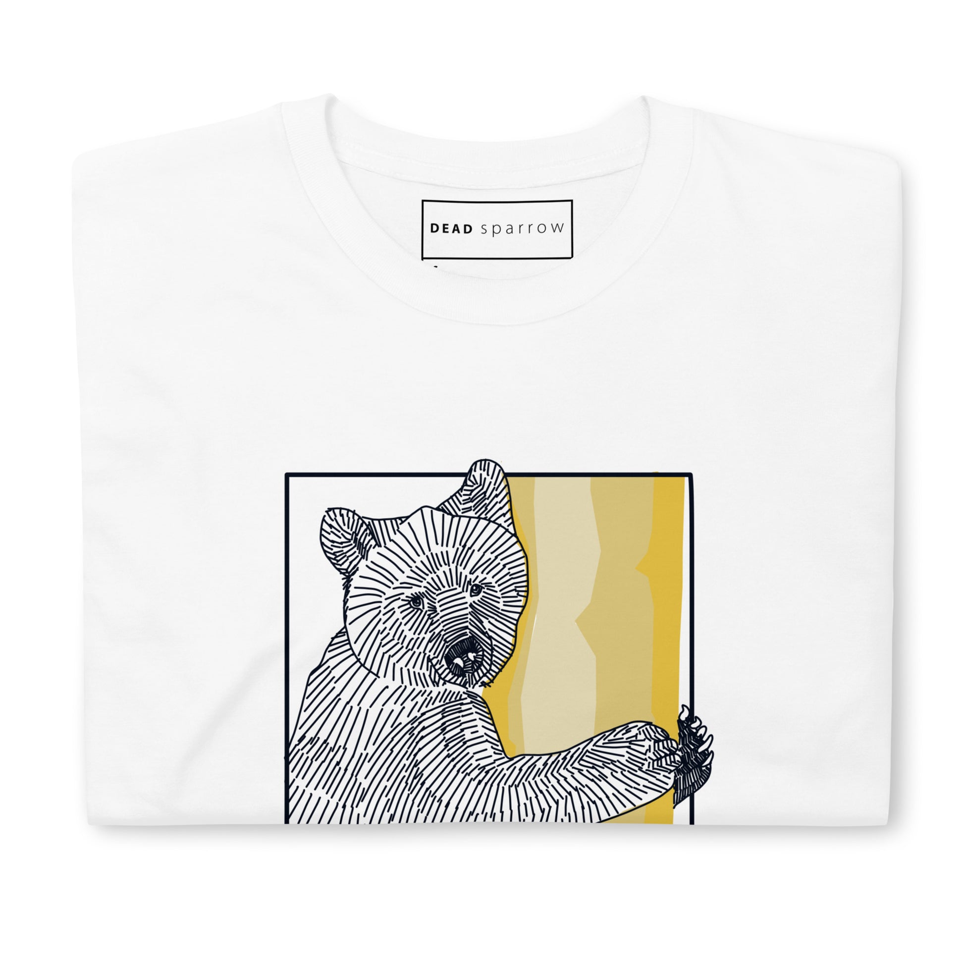 Image of a folded white T-shirt with an bear print. Underneath the print it says 'Strenght is not always loud".