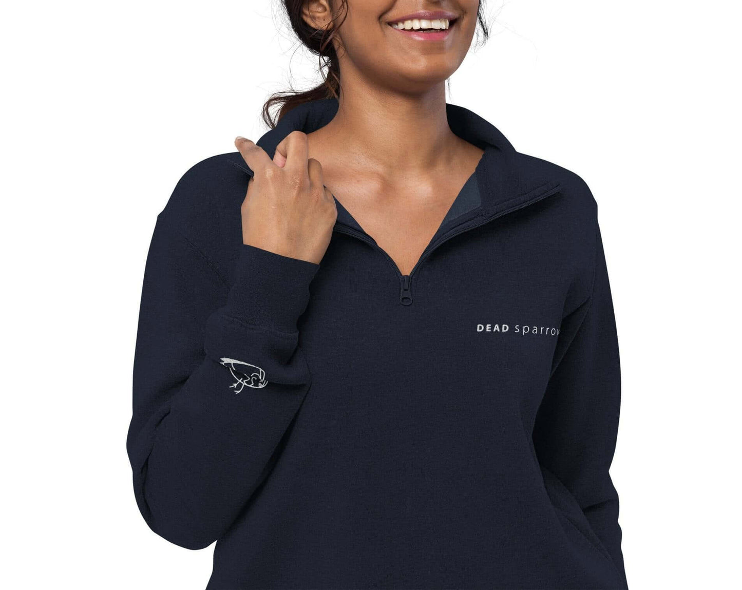 Image of a woman in a navy blue zippered sweatshirt. Product name Outstanding.