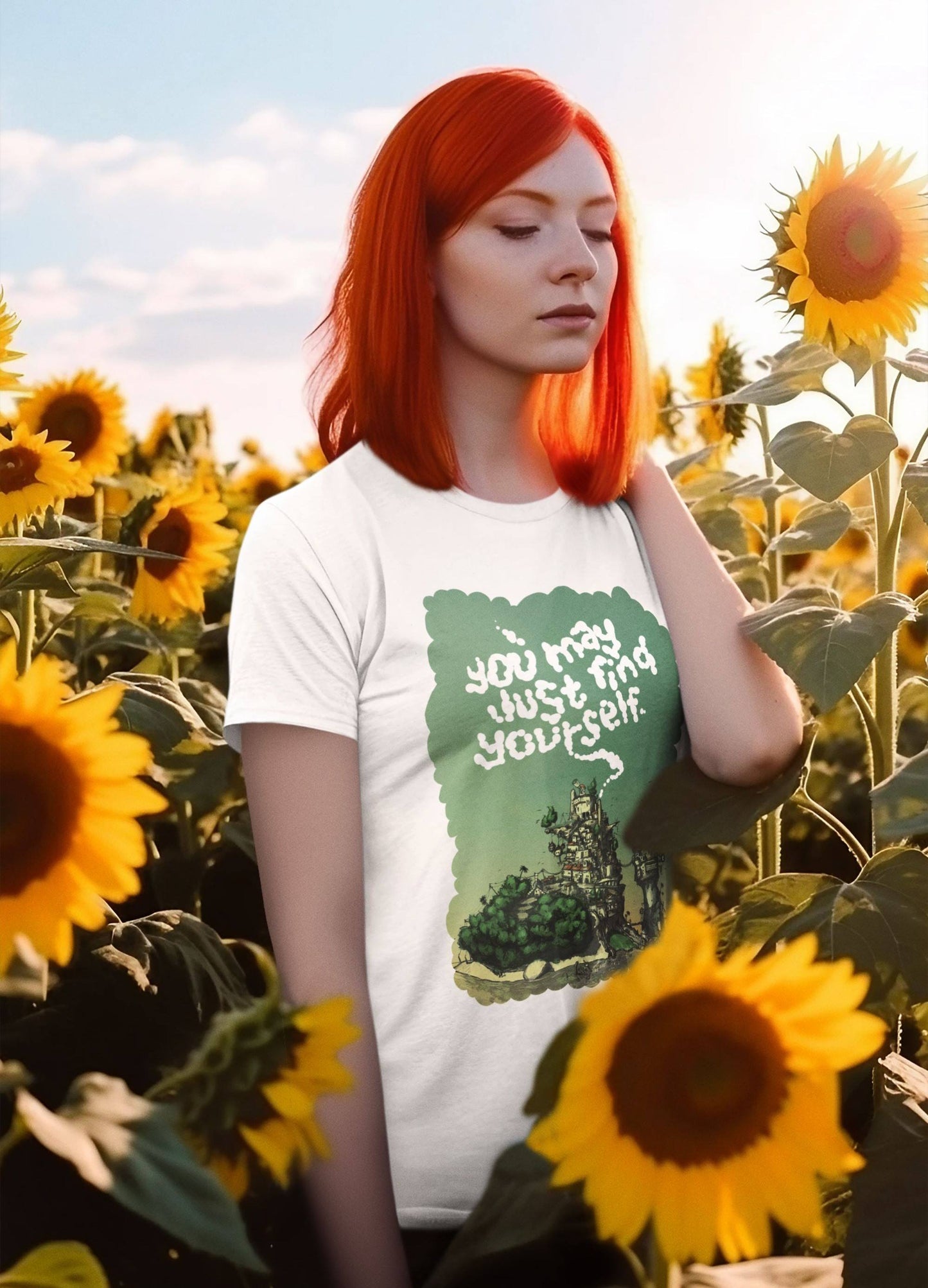 Image of a woman wearing a white t-shirt for women.  Text in the centre of the t-shirt "You may just find yourself". Product name Peacful.