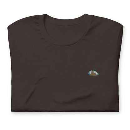 Image of a brown DEADsparrow t-shirt. The t-shirt is a tighter model with a sparrow embroidered on the left side of the t-shirt. Product name Wise