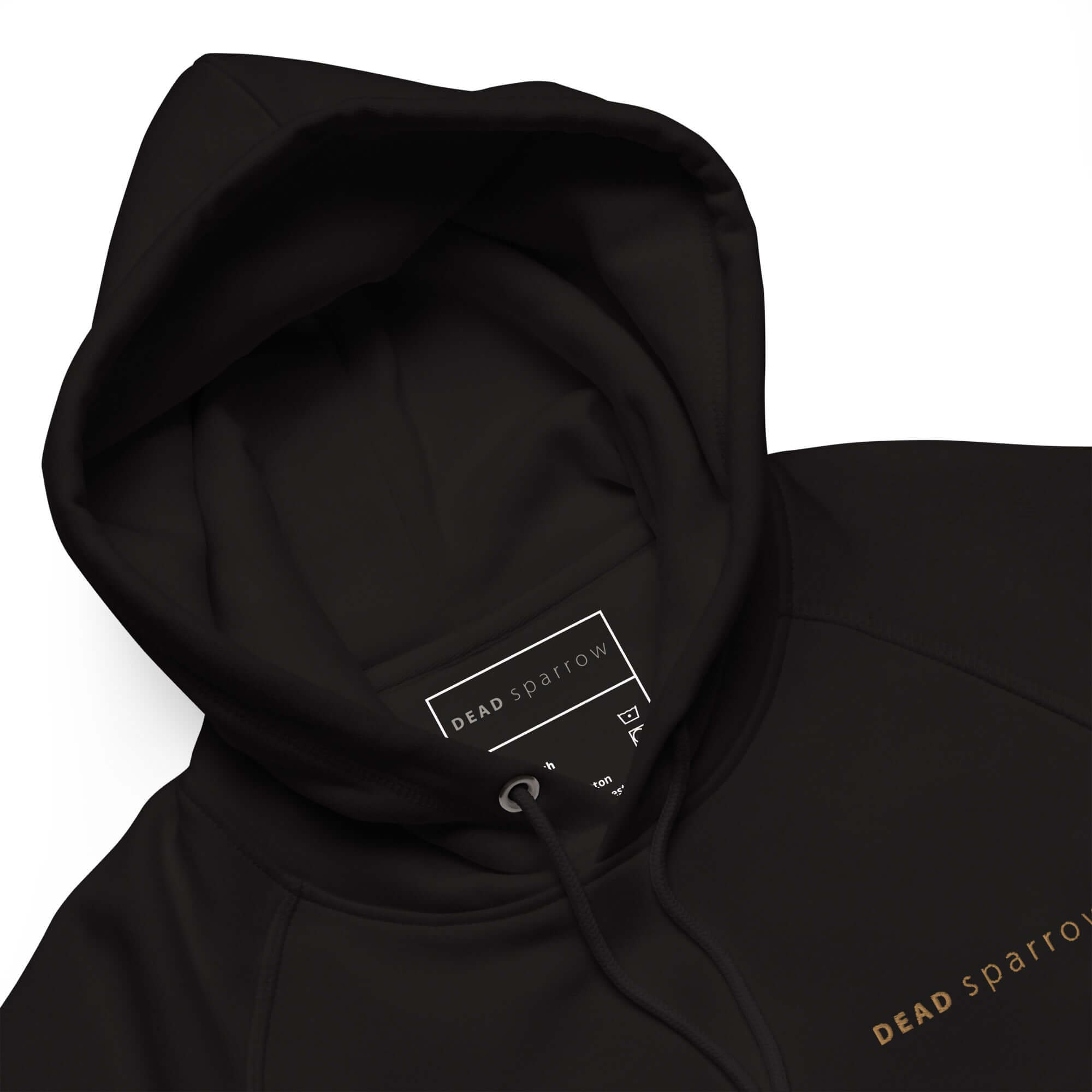 Close-up of a black eco-friendly hoodie for women. The image shows the details of the hoodie, the matching round drawstrings with metal tips and eyelets, and the quality of the embroidery. Product name Amazing.