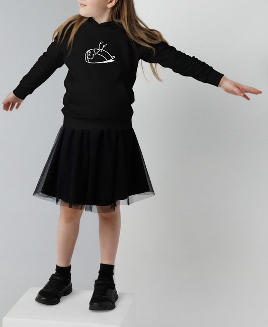 Close-up of a girl wearing a black eco-friendly hoodie for children. The DEAD sparrow logo is printed in white on the front of the hoodie. Product name Brilliant.