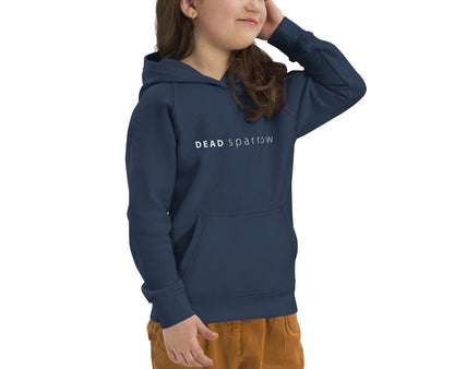 Close-up of a girl wearing a navy eco-friendly hoodie for children. It says DEADsparrow in white colour on the hoodie. Product name Interesting. 