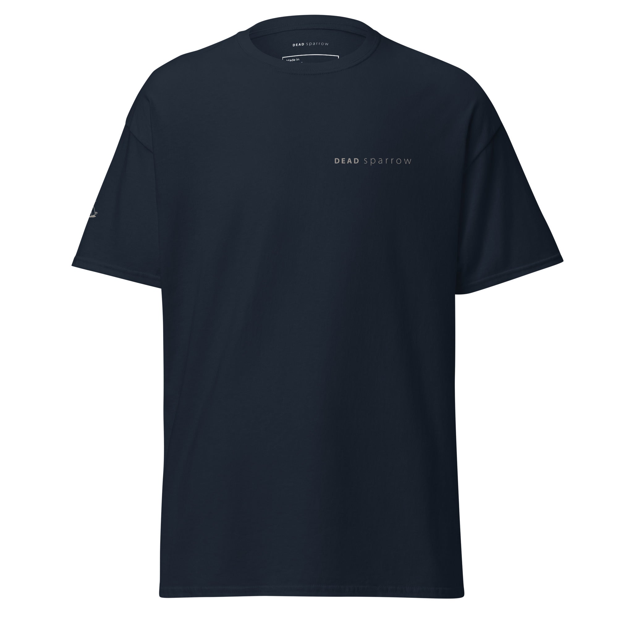 Image of a navy t-shirt, item name Hopeful. It has print both on the right sleeve and left side. Sparrow on the right sleeve and the text DEAD sparrow on the left side of the t-shirt.