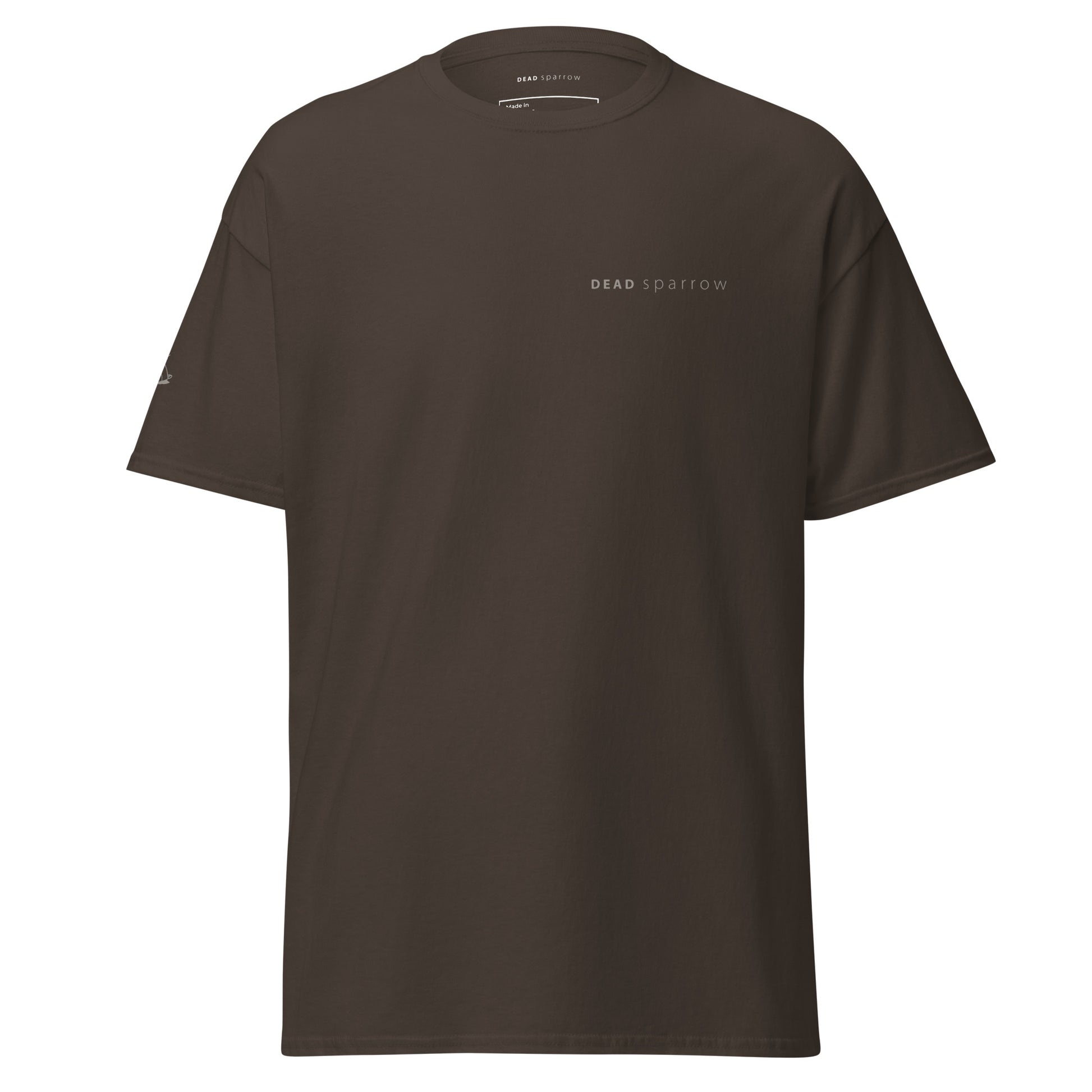 Image of a dark choclate t-shirt, item name Hopeful. It has print both on the right sleeve and left side. Sparrow on the right sleeve and the text DEAD sparrow on the left side of the t-shirt.