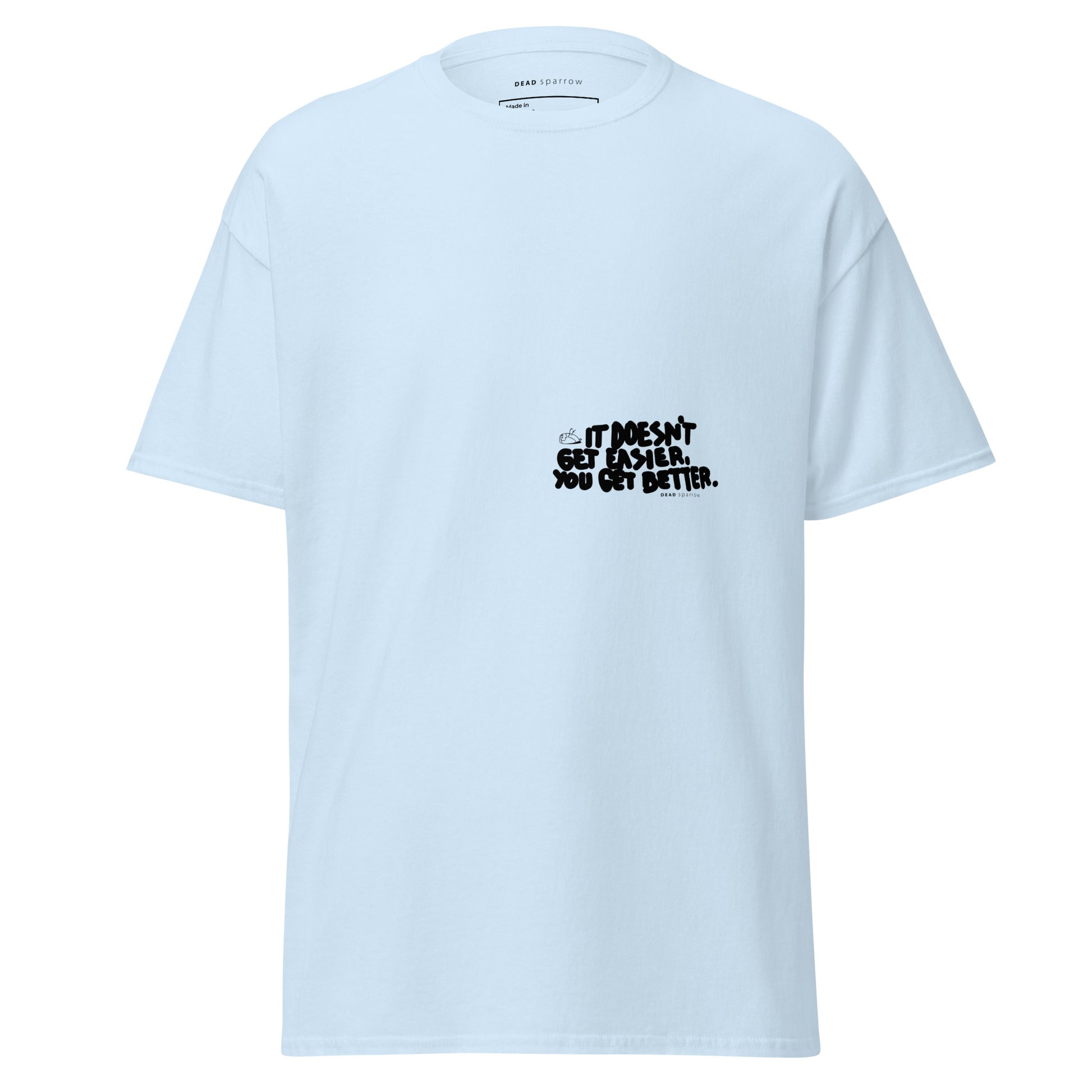 Image of a t-shirt for men. The color of the t-shirt is light blue. On the left side of the t-shirt, there is a quote that reads "dosen`t get easier you get better". The product name of the t-shirt is Admirable. 